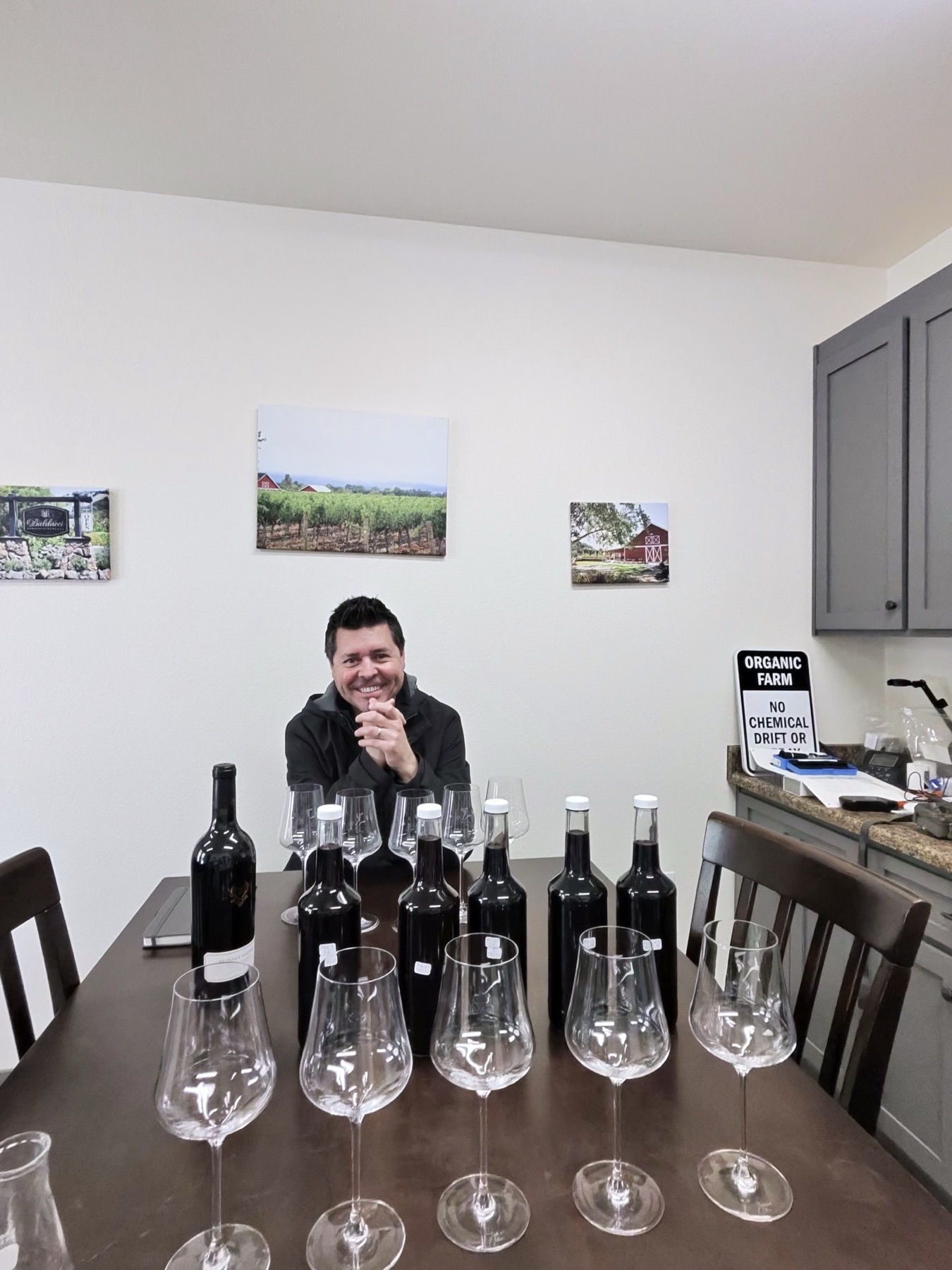 Michael at the blending table with the numbered component samples and tasting glasses.